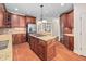 Spacious kitchen with granite countertops, stainless steel appliances, and a central island at 39 Forked Pine Ct, Chapel Hill, NC 27517