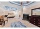 A spacious main bedroom features a fireplace, tray ceiling, and ensuite bathroom at 39 Forked Pine Ct, Chapel Hill, NC 27517
