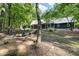Beautiful backyard with fire pit and bench seating, perfect for outdoor entertaining and relaxation at 4022 Tecolote Way, Hillsborough, NC 27278