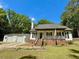 Charming single-story home with manicured lawn and brick accent, complemented by an attached two-car garage at 4057 Old Franklinton Rd, Franklinton, NC 27525
