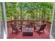Private balcony offering serene views of the surrounding greenery and nature at 412 Bowen Rd, Rougemont, NC 27572