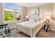 Bedroom with a large window, queen bed, and work out equipment at 412 Bowen Rd, Rougemont, NC 27572