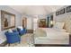 Spacious main bedroom with large mirror, sitting area and decorative rug at 412 Bowen Rd, Rougemont, NC 27572