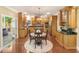 Open concept living area with a kitchen, dining area, and porch access at 412 Bowen Rd, Rougemont, NC 27572