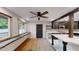 Open kitchen and eating area with lots of natural light and natural accents at 4501 Rockwood Dr, Raleigh, NC 27612