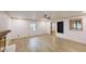 Bright living room features recessed lighting and a wood burning fireplace with views of the yard at 4501 Rockwood Dr, Raleigh, NC 27612