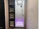 This is a standing shower that includes a dark shelving unit at 4501 Rockwood Dr, Raleigh, NC 27612