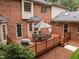 Wooden deck features outdoor seating and a stainless steel grill at 4505 Wood Valley Dr, Raleigh, NC 27613