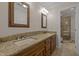 Elegant bathroom with double sink vanity, granite countertop, and a glass-enclosed shower at 4505 Wood Valley Dr, Raleigh, NC 27613