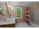 Charming bathroom featuring a double vanity and a shower-tub combination at 4505 Wood Valley Dr, Raleigh, NC 27613