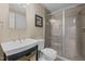 Bright bathroom features a glass-enclosed shower and updated vanity at 4505 Wood Valley Dr, Raleigh, NC 27613