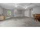 Large bonus room with gray carpet, light walls, and a small workspace at 4505 Wood Valley Dr, Raleigh, NC 27613