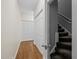 Hallway leading to a stairway and multiple closets at 4505 Wood Valley Dr, Raleigh, NC 27613