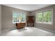 Inviting sitting room filled with natural light and furnished with classic decor at 4505 Wood Valley Dr, Raleigh, NC 27613