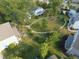 Gorgeous aerial shot featuring a community park, homes, walking path, and lush landscaping at 457 S Greensboro St, Carrboro, NC 27510