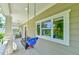 Welcoming front porch with swing and seating area at 457 S Greensboro St, Carrboro, NC 27510