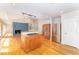Kitchen featuring granite countertops, a central island with a cooktop, and stainless appliances at 4832 Brookhaven Dr, Raleigh, NC 27612