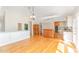 Open-concept kitchen features hardwood floors, stainless steel appliances, and granite countertops at 4832 Brookhaven Dr, Raleigh, NC 27612