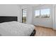 Bedroom featuring a large bed and big windows that let in plenty of natural light at 512 Gordon St # 1006, Durham, NC 27701