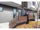 Entrance showcasing the modern architectural style with metal railings and wood accents at 512 Gordon St # 1006, Durham, NC 27701