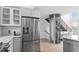 The contemporary kitchen has stainless steel refrigerator, hardwood floors, and access to the elevator at 512 Gordon St # 1006, Durham, NC 27701