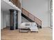 Open floorplan living room featuring a residential elevator, hardwood floors, lots of natural light and staircase at 512 Gordon St # 1006, Durham, NC 27701