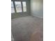 This spacious bedroom has plush carpeting, neutral paint and a large window offering natural light at 5122 Jessip St, Morrisville, NC 27560