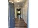 Inviting entryway with durable hardwood floors and multiple closet spaces for ample storage at 5122 Jessip St, Morrisville, NC 27560