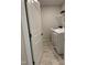 Laundry room with tile flooring, door entry, and white washer and dryer at 5122 Jessip St, Morrisville, NC 27560