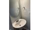 Neat half-bath with pedestal sink, decorative mirror, and neutral wall color at 5122 Jessip St, Morrisville, NC 27560