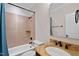 Clean bathroom features a shower-tub combo, granite countertop, and classic fixtures at 5217 Roswellcrest Ct, Apex, NC 27539