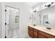 Bathroom with double vanity and tiled floors at 5217 Roswellcrest Ct, Apex, NC 27539