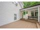 Back deck featuring outdoor seating and views of the backyard, offering a perfect spot for relaxation at 5241 Mill Dam Rd, Wake Forest, NC 27587