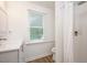 Clean bathroom with modern fixtures, a shower, and a window for natural light at 5241 Mill Dam Rd, Wake Forest, NC 27587