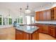 Open kitchen featuring granite countertops, island, and stainless steel appliances at 5241 Mill Dam Rd, Wake Forest, NC 27587
