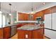 Spacious kitchen featuring custom cabinets, granite counters, and modern appliances at 5241 Mill Dam Rd, Wake Forest, NC 27587