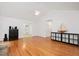 Open living room with hardwood floors and bright interiors at 5241 Mill Dam Rd, Wake Forest, NC 27587