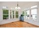 Bright sunroom with large windows offering scenic views at 5241 Mill Dam Rd, Wake Forest, NC 27587