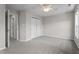 Bright bedroom with carpet, fan, and closet at 5310 Echo Ridge Rd, Raleigh, NC 27612