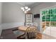 Bright breakfast nook featuring banquette seating and sliding glass doors to the deck at 5310 Echo Ridge Rd, Raleigh, NC 27612