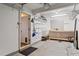 Well-organized garage features wall shelving, pegboard, and workbench for efficient storage and easy access to tools at 5310 Echo Ridge Rd, Raleigh, NC 27612