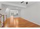 Open floor plan with hardwood floors and easy access to the kitchen and upper levels at 5310 Echo Ridge Rd, Raleigh, NC 27612