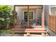 Outdoor patio features two chairs and sliding glass doors, perfect for relaxing or enjoying the outdoor scenery at 5310 Echo Ridge Rd, Raleigh, NC 27612