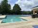 Community swimming pool offers a refreshing escape with ample lounge chairs for a relaxing sun-soaked experience at 5310 Echo Ridge Rd, Raleigh, NC 27612