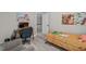 Bedroom with a twin bed, desk, and a comfortable armchair at 59 Mill Rd, Pittsboro, NC 27312