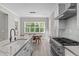Modern kitchen featuring sleek countertops and stainless steel appliances at 59 Mill Rd, Pittsboro, NC 27312