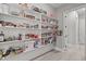 Walk-in pantry provides plentiful storage with organized shelving for all your essentials at 59 Mill Rd, Pittsboro, NC 27312