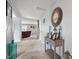 Welcoming hallway showcasing carpet floors, neutral colors, stylish decor and smooth transition to the living room at 59 Nevada Ct, Clayton, NC 27527