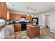 Modern kitchen showcasing wood cabinets, black appliances, and a functional center island at 59 Nevada Ct, Clayton, NC 27527