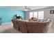 Cozy living room offers lots of seating, a TV, and a large window for natural light at 59 Nevada Ct, Clayton, NC 27527